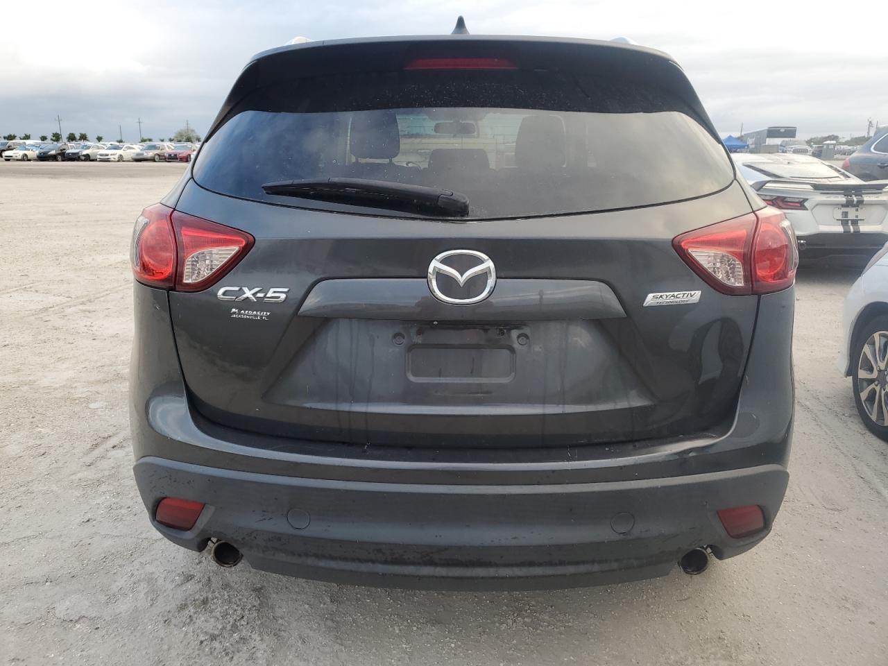 2014 Mazda Cx-5 Touring VIN: JM3KE2CYXE0386299 Lot: 76399794