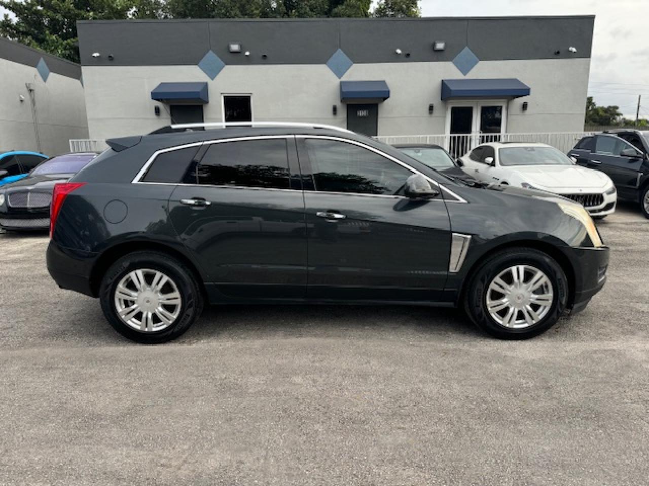 2014 Cadillac Srx Luxury Collection VIN: 3GYFNBE31ES565474 Lot: 77046664