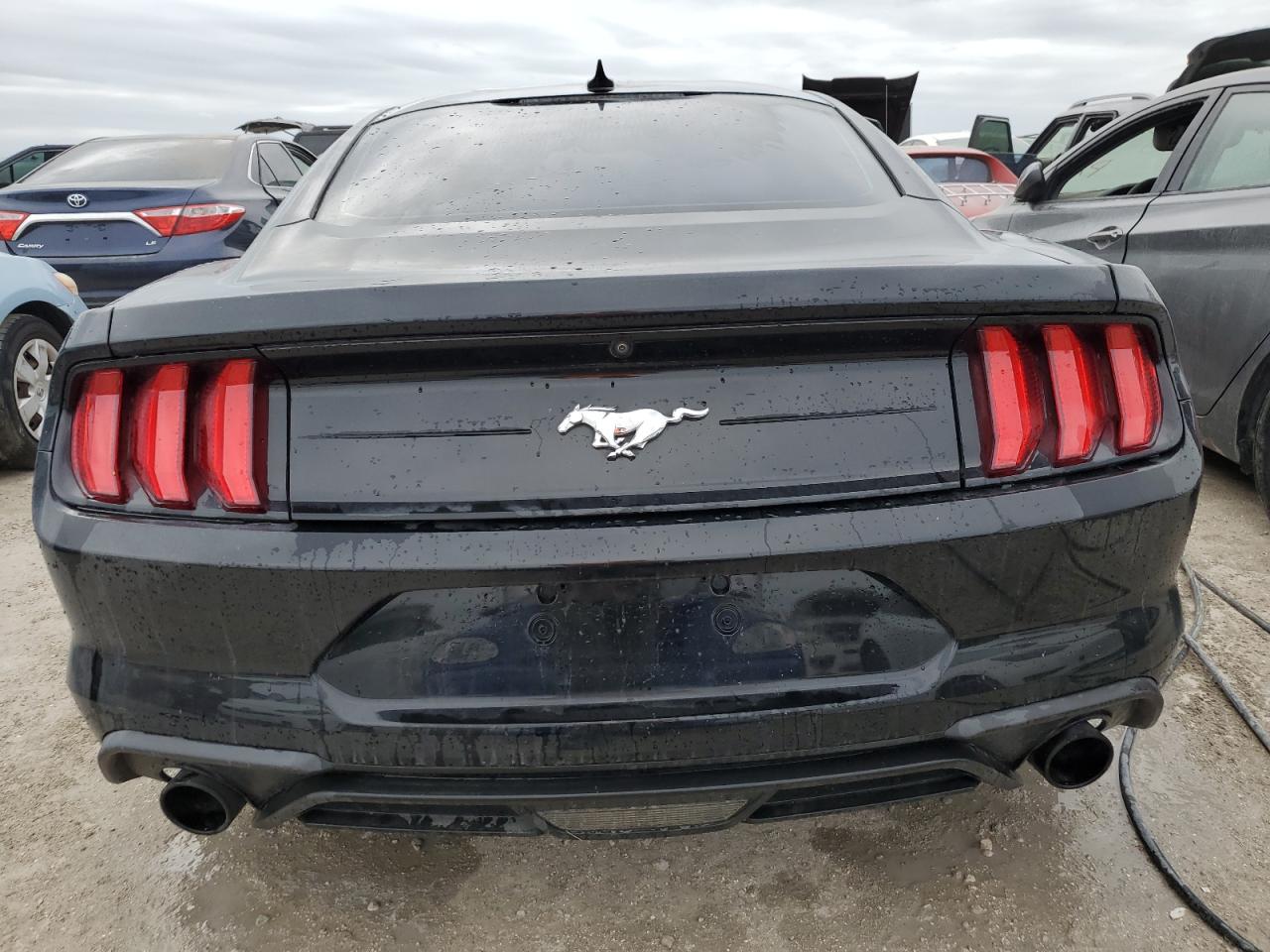 2021 Ford Mustang VIN: 1FA6P8TH6M5107882 Lot: 76064654