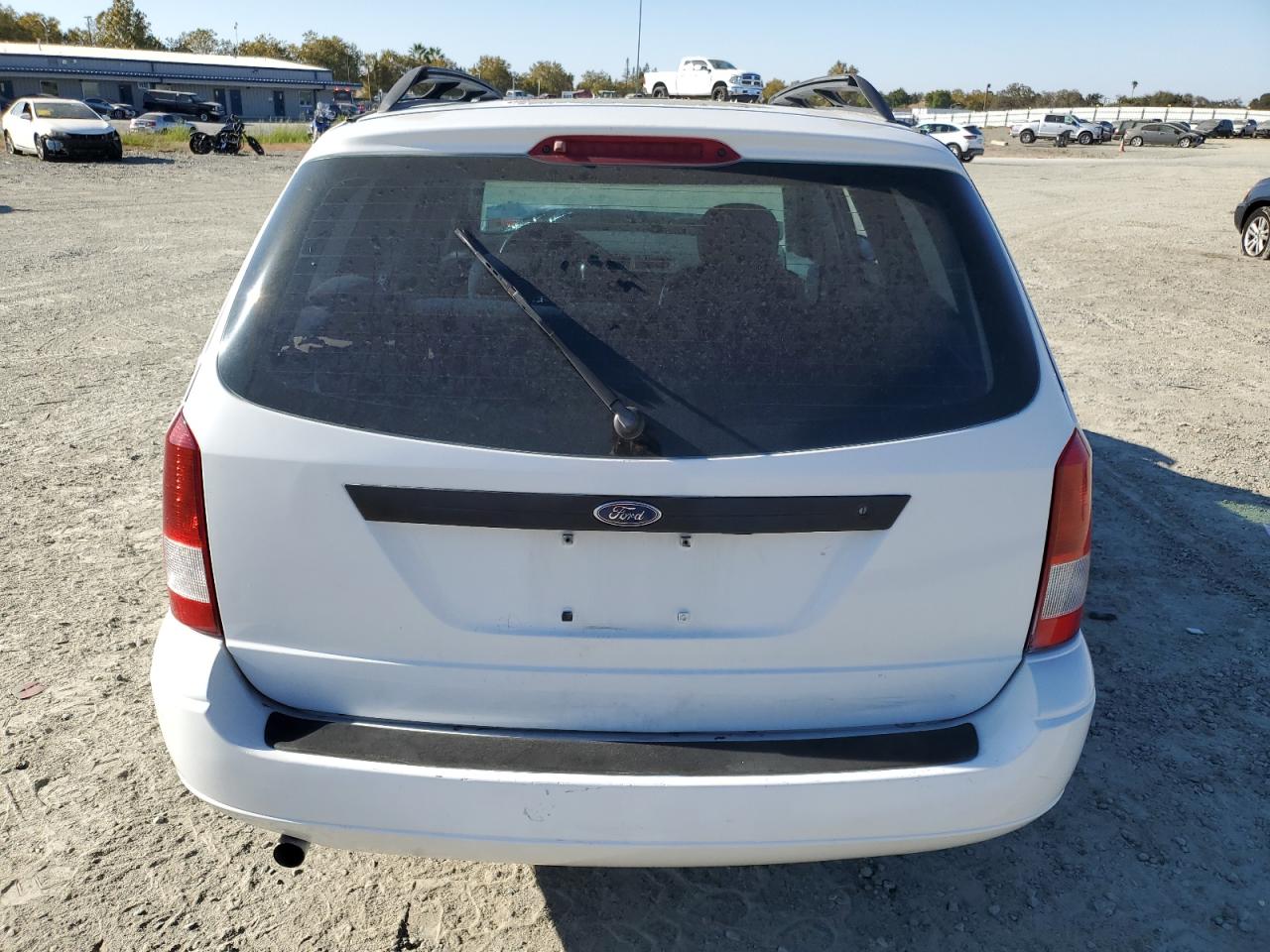 2005 Ford Focus Zxw VIN: 1FAFP36N05W174669 Lot: 75888414