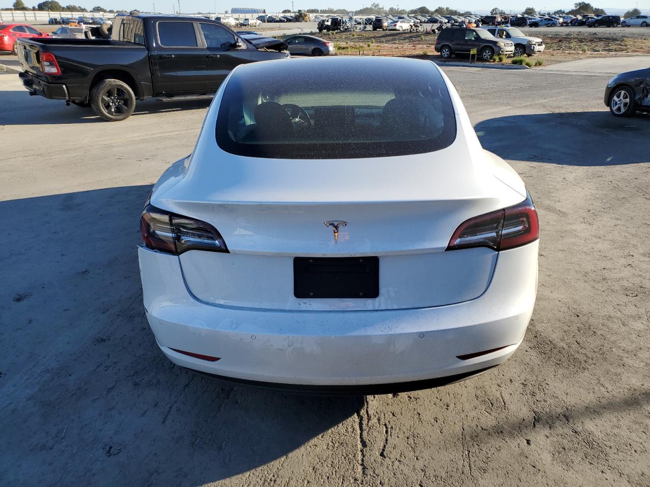 2018 Tesla Model 3 VIN: 5YJ3E1EAXJF162372 Lot: 76944864