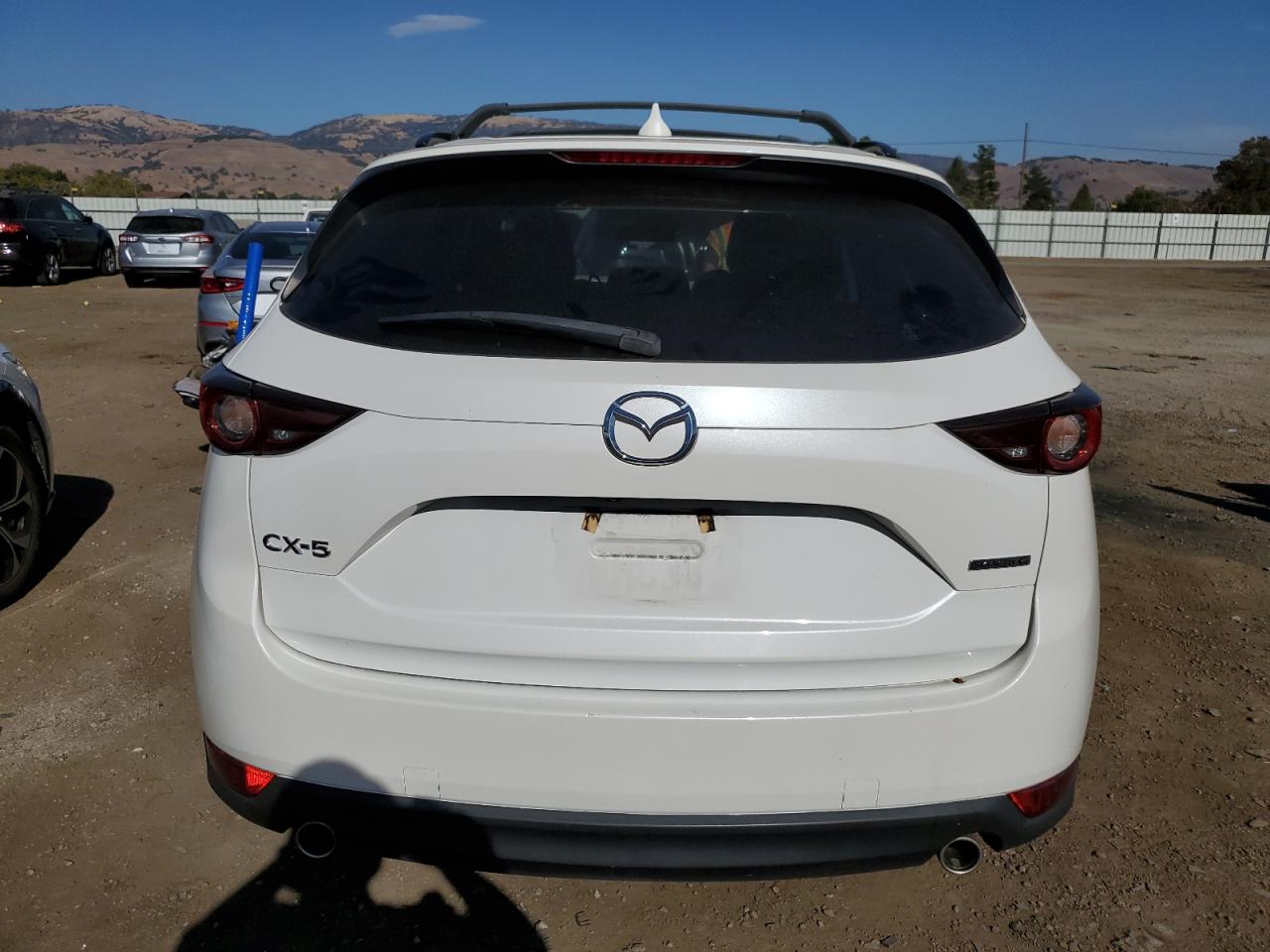 2020 Mazda Cx-5 Touring VIN: JM3KFACM2L1790080 Lot: 74633144