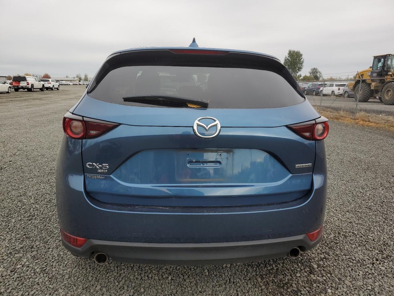 2021 Mazda Cx-5 Touring VIN: JM3KFBCM7M0321211 Lot: 75868454