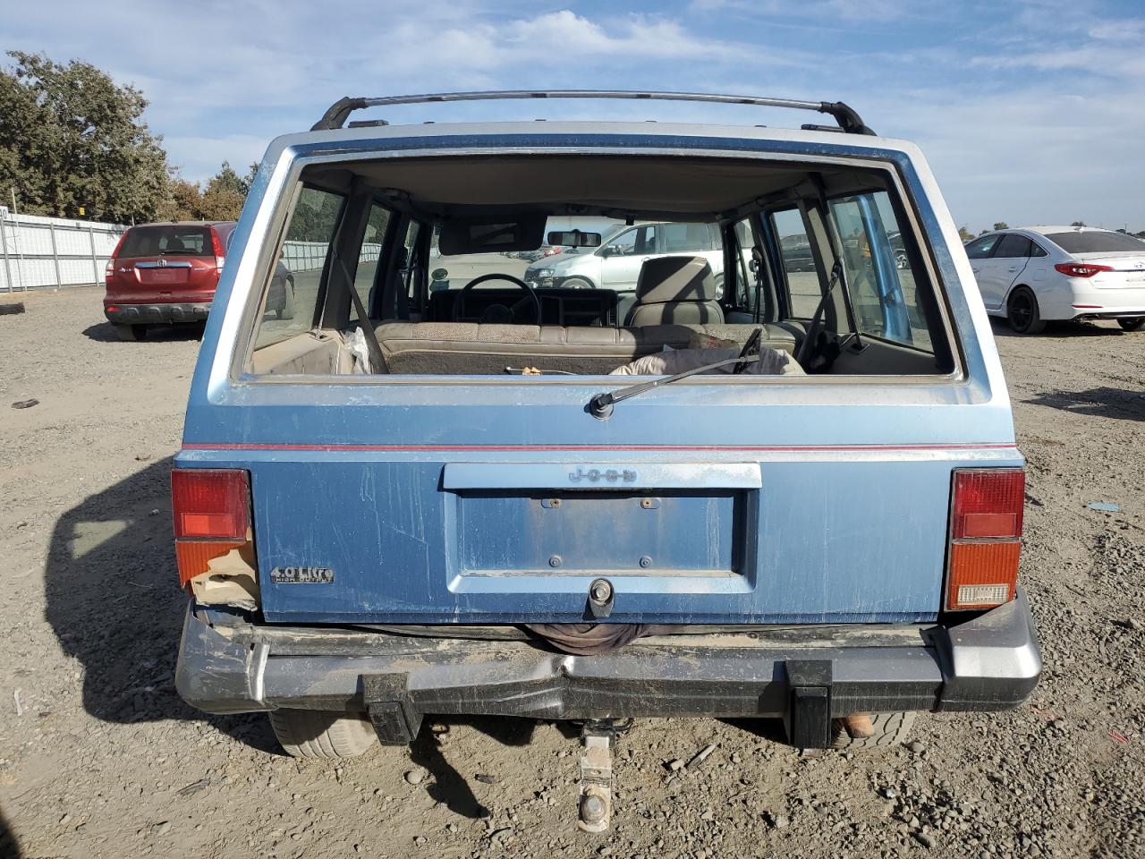 1991 Jeep Cherokee Laredo VIN: 1J4FJ58S1ML520376 Lot: 75452364