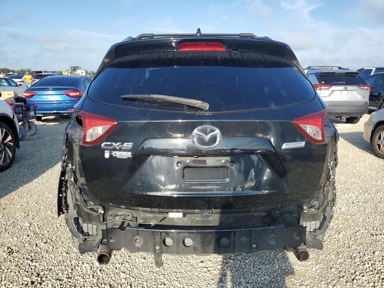 2015 Mazda Cx-5 Touring VIN: JM3KE2CY6F0526818 Lot: 72991514