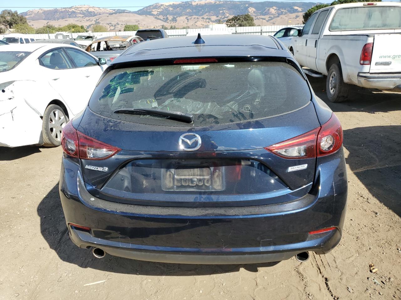 2018 Mazda 3 Grand Touring VIN: 3MZBN1M37JM227279 Lot: 76279444