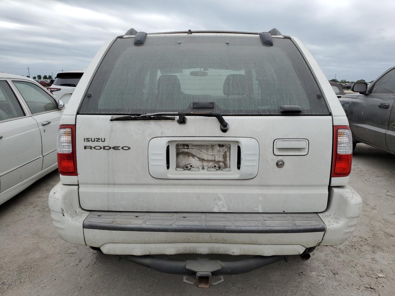 2002 Isuzu Rodeo S VIN: 4S2DM58W324327147 Lot: 75194104