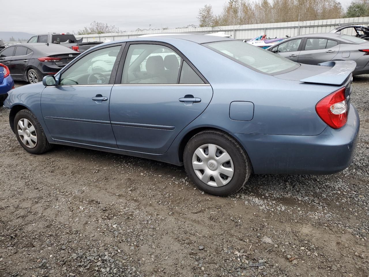 2003 Toyota Camry Le VIN: JTDBE32K130153274 Lot: 76561004