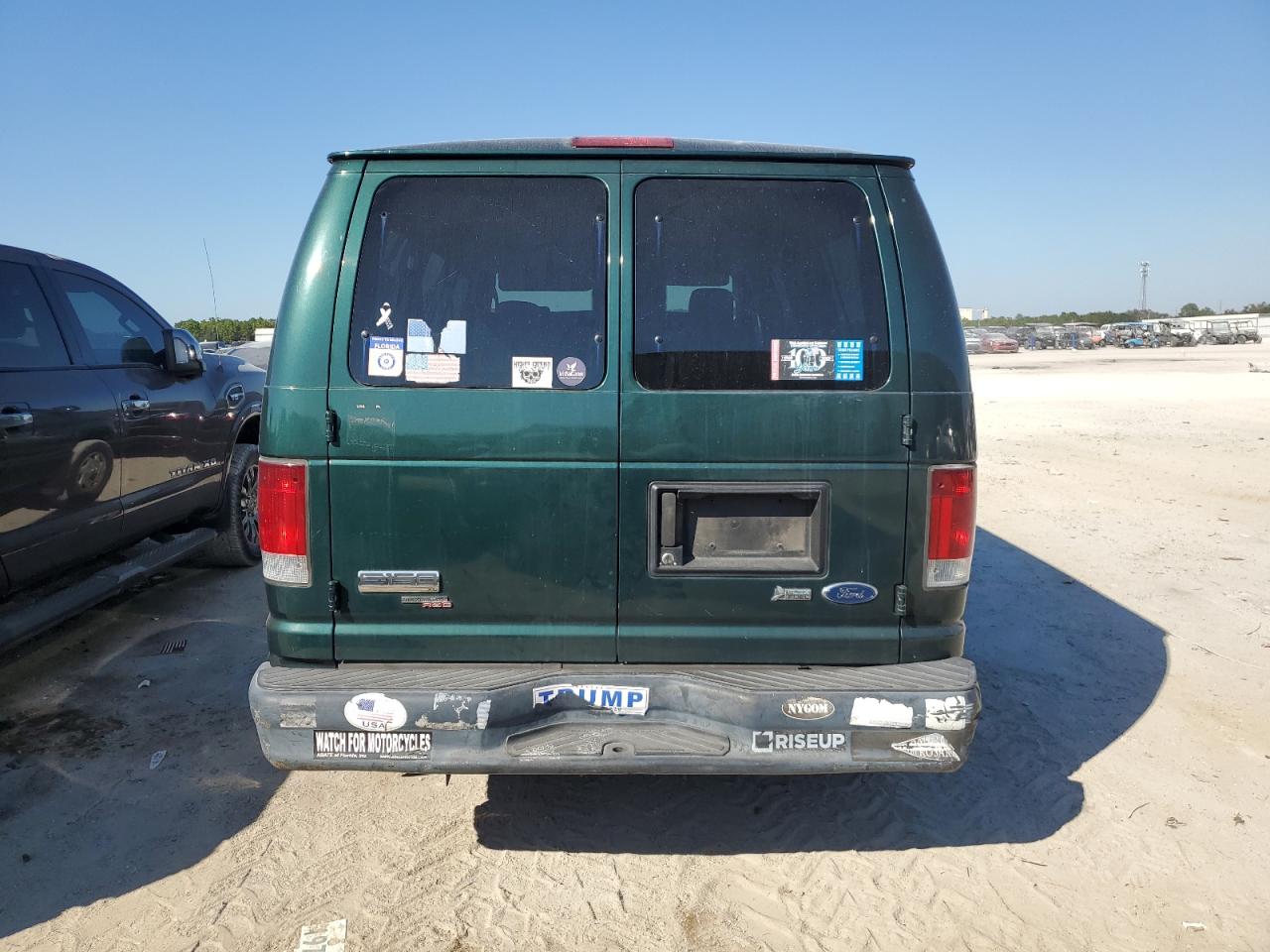 2009 Ford Econoline E150 Wagon VIN: 1FMNE11W19DA56899 Lot: 76610224