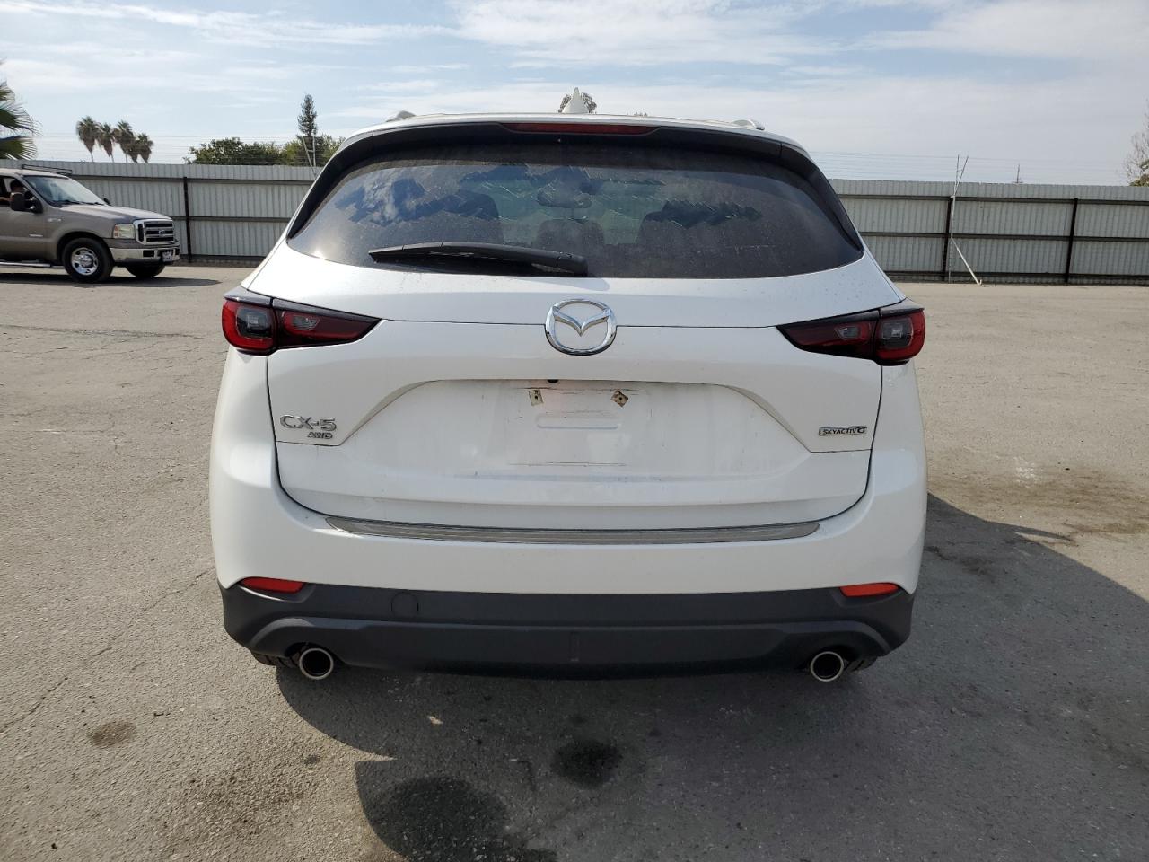 2022 Mazda Cx-5 Premium VIN: JM3KFBDMXN0616920 Lot: 75572554