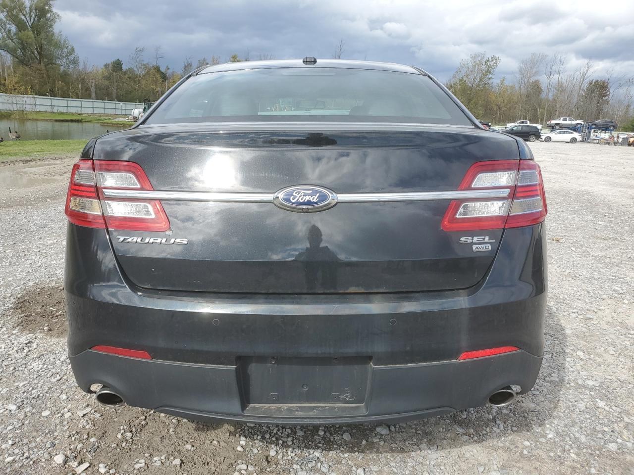 2014 Ford Taurus Sel VIN: 1FAHP2H84EG116956 Lot: 75356534