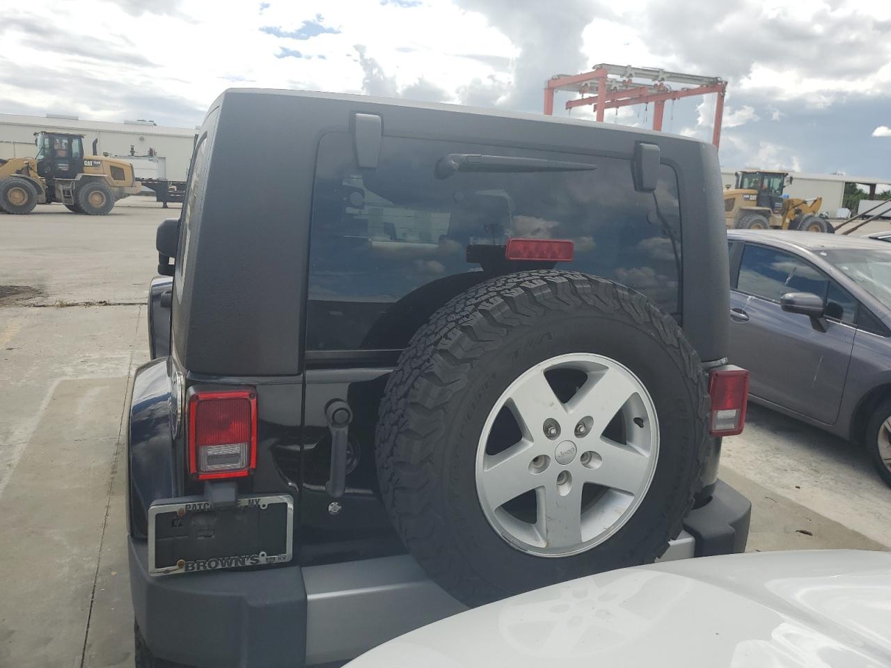 2010 Jeep Wrangler Sahara VIN: 1J4AA5D15AL229429 Lot: 74849734