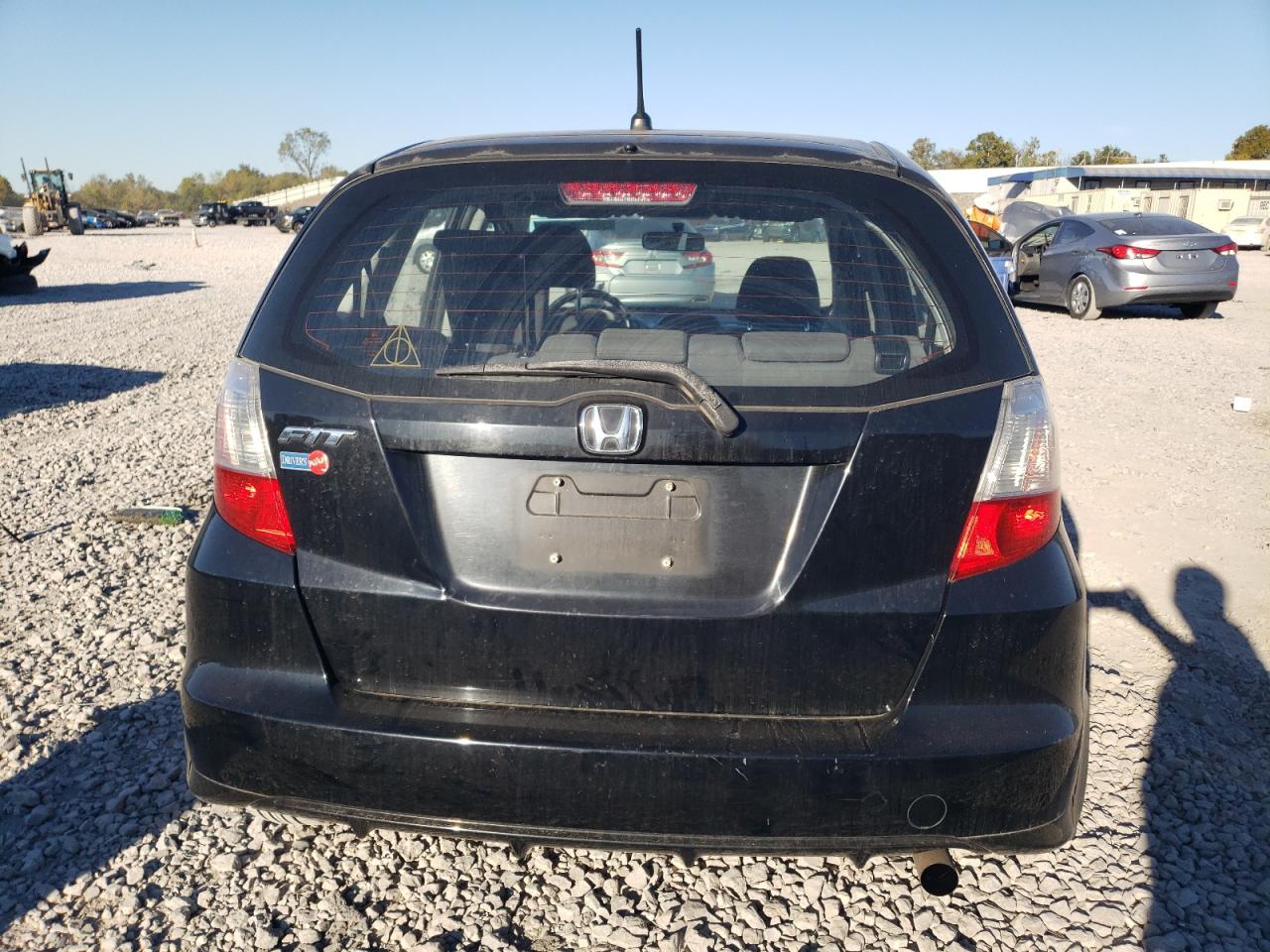 2011 Honda Fit VIN: JHMGE8H33BS002828 Lot: 76655834