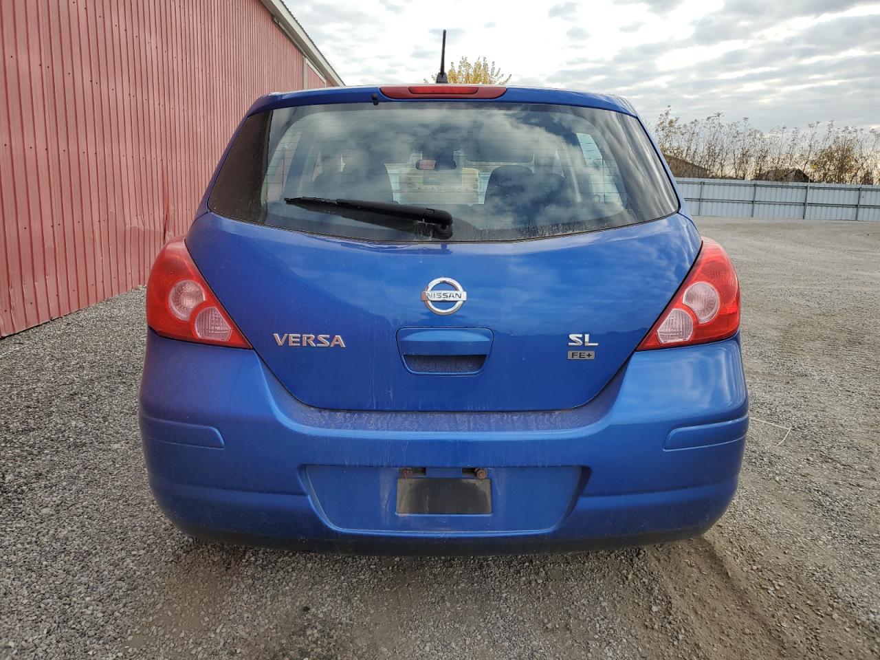 2009 Nissan Versa S VIN: 3N1BC13E99L493354 Lot: 76593594