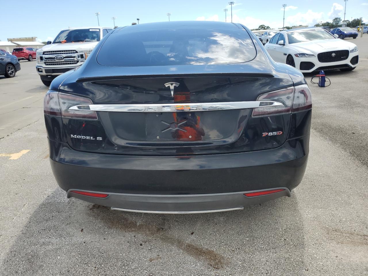 2014 Tesla Model S VIN: 5YJSA1H25EFP66090 Lot: 73652064