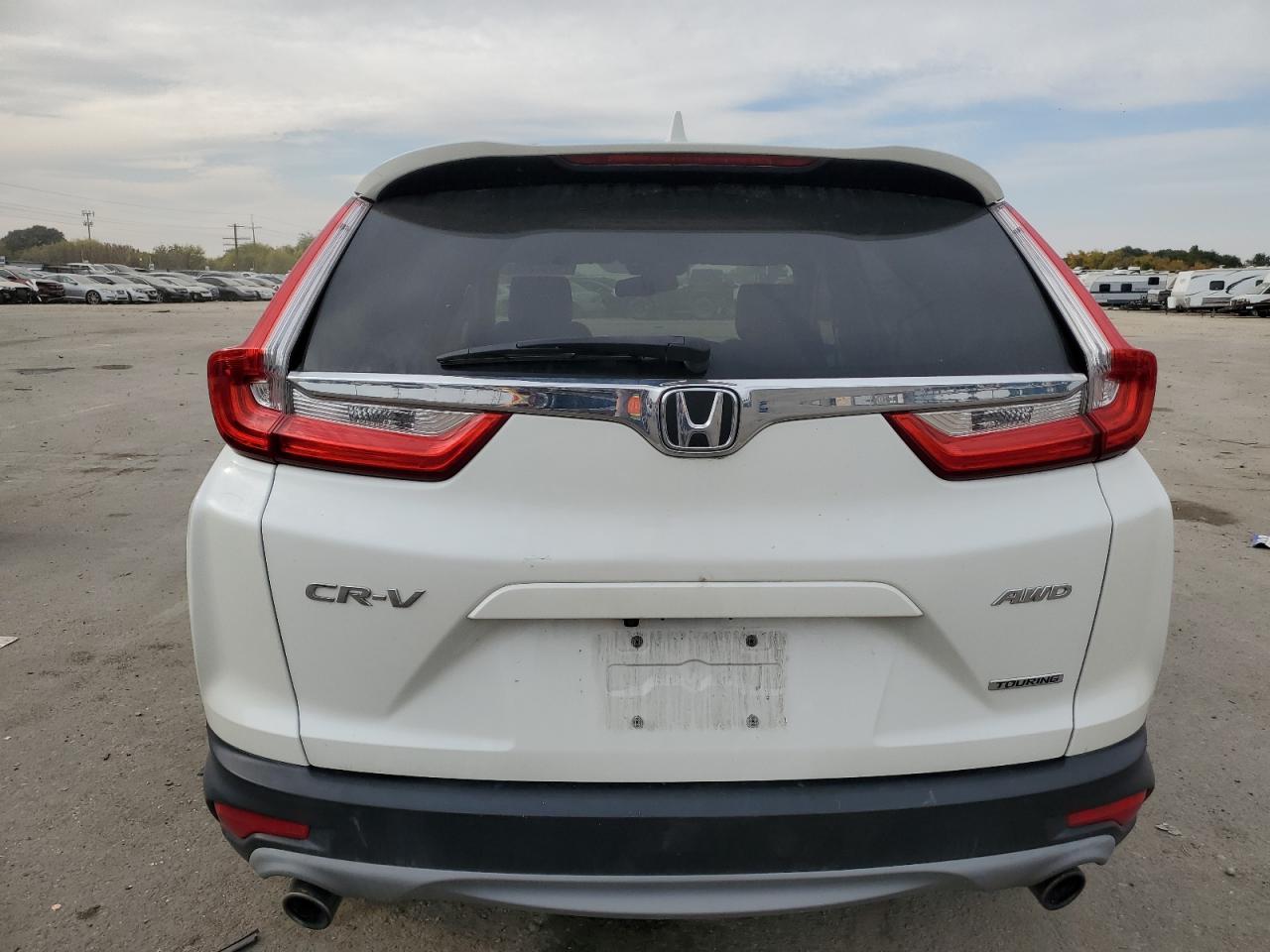 2018 Honda Cr-V Touring VIN: 2HKRW2H90JH605869 Lot: 75066374