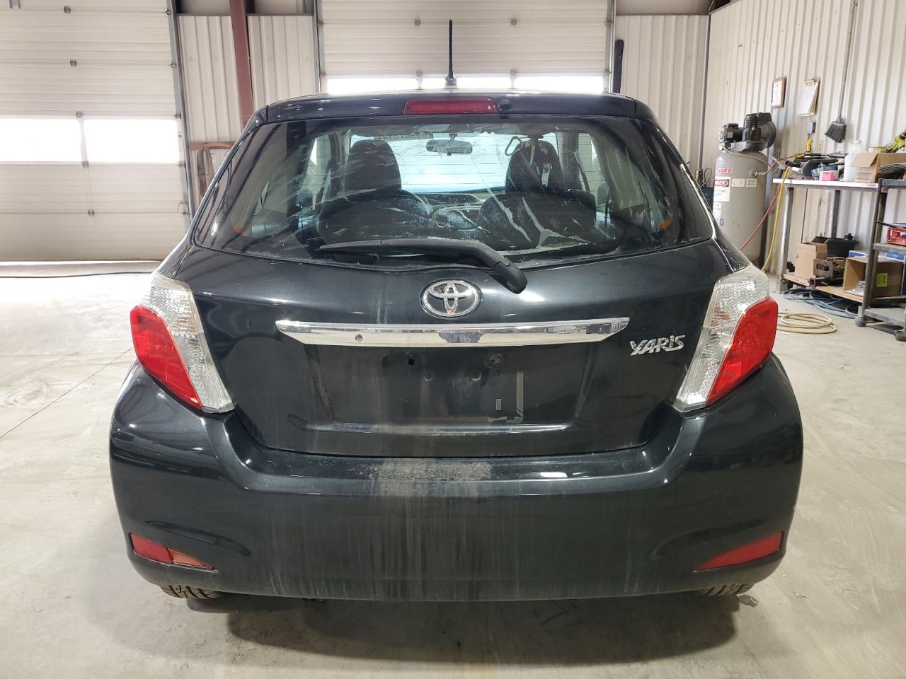 2012 Toyota Yaris VIN: JTDJTUD34CD513028 Lot: 69987314