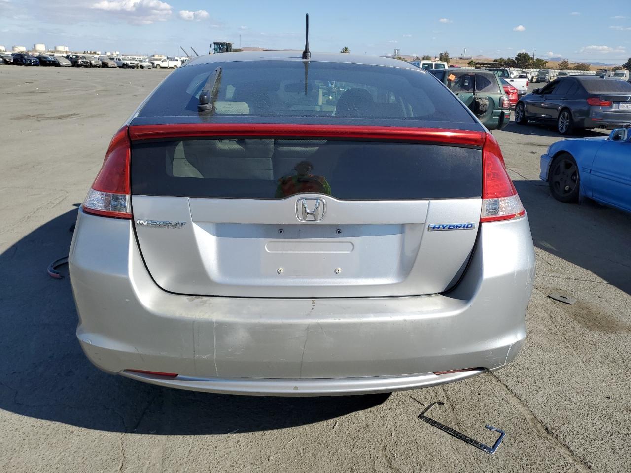 2010 Honda Insight Ex VIN: JHMZE2H76AS017203 Lot: 76763594