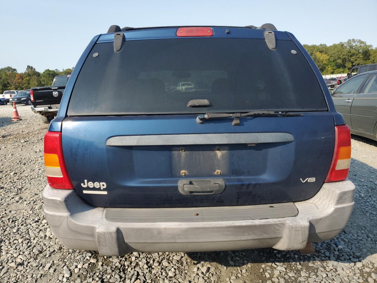 1999 Jeep Grand Cherokee Laredo VIN: 1J4GW58N9XC761154 Lot: 75796874