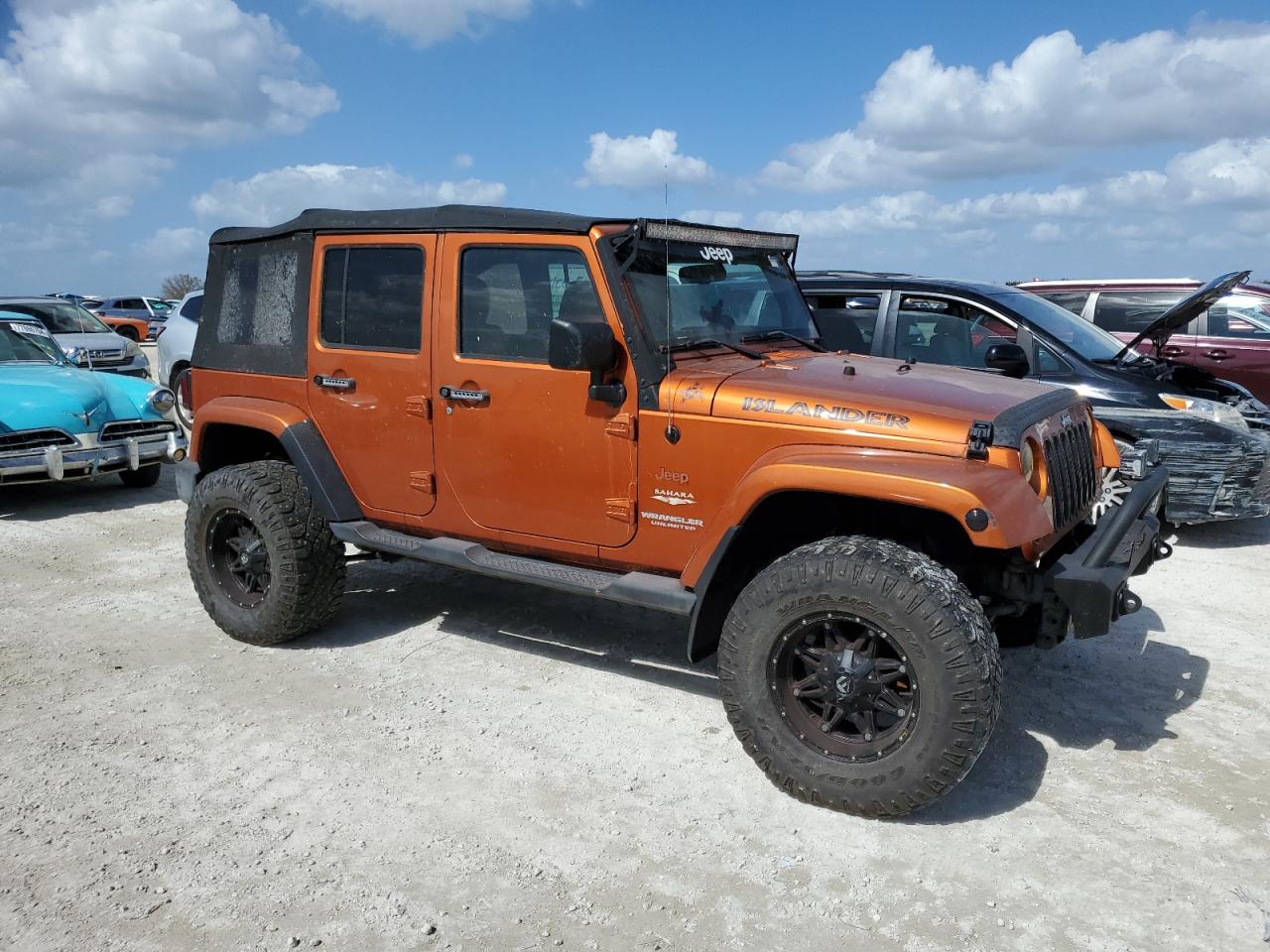 2011 Jeep Wrangler Unlimited Sahara VIN: 1J4BA5H10BL618334 Lot: 78225944