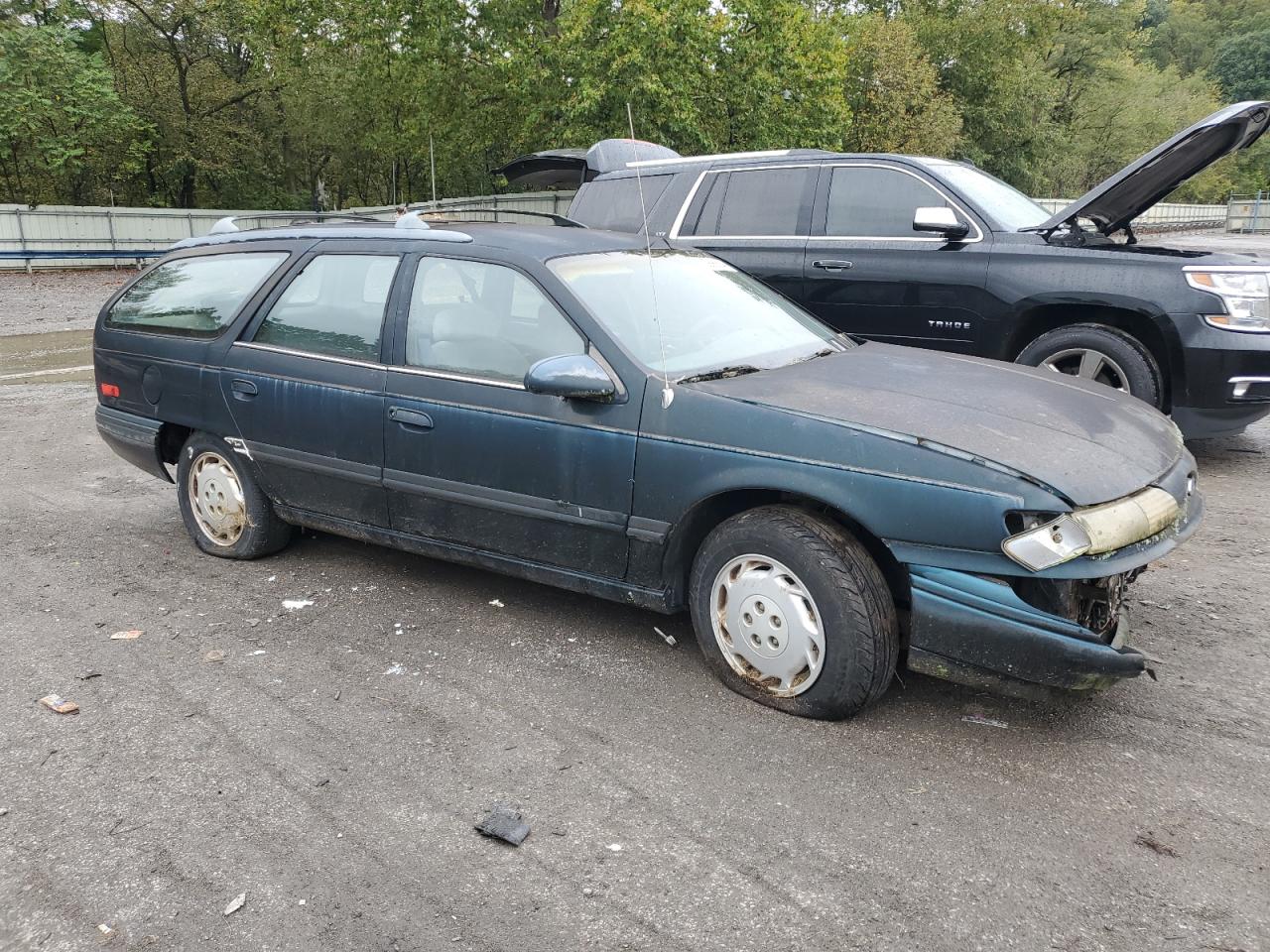 1995 Ford Taurus Gl VIN: 1FALP57U7SA210516 Lot: 73996664