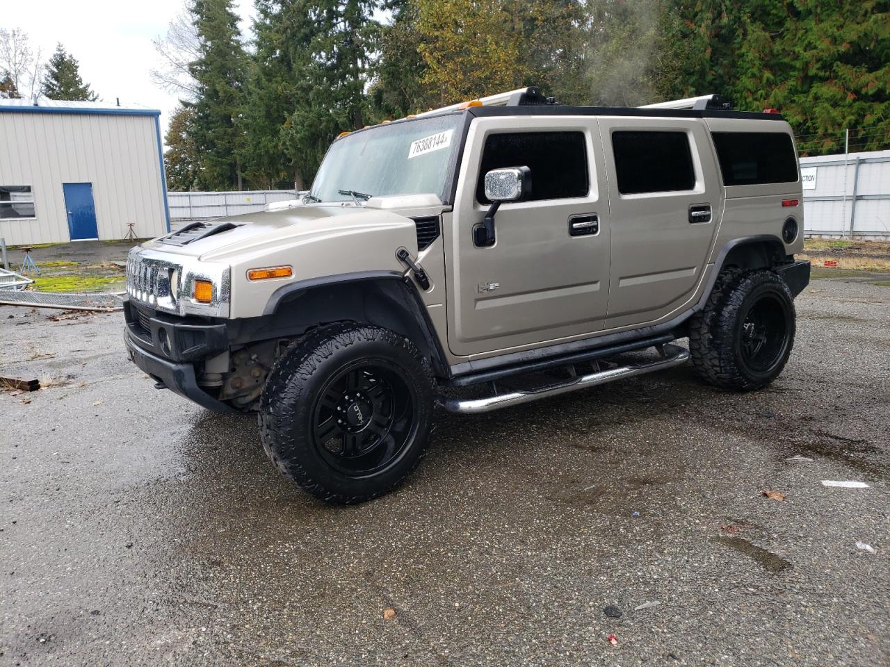 2003 Hummer H2 VIN: 5GRGN23U73H111109 Lot: 76388144