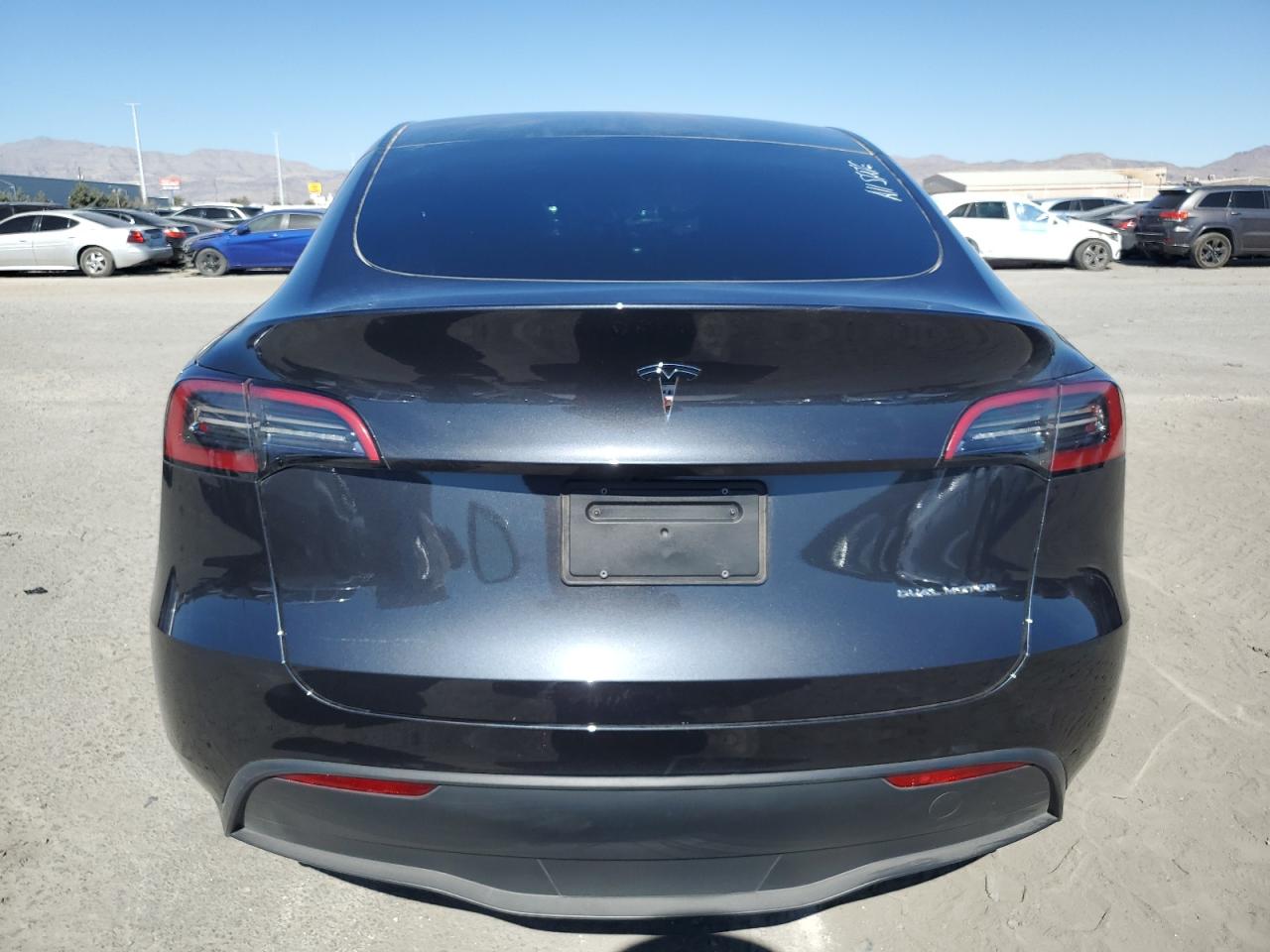 2024 Tesla Model Y VIN: 7SAYGAEEXRF986437 Lot: 77439004