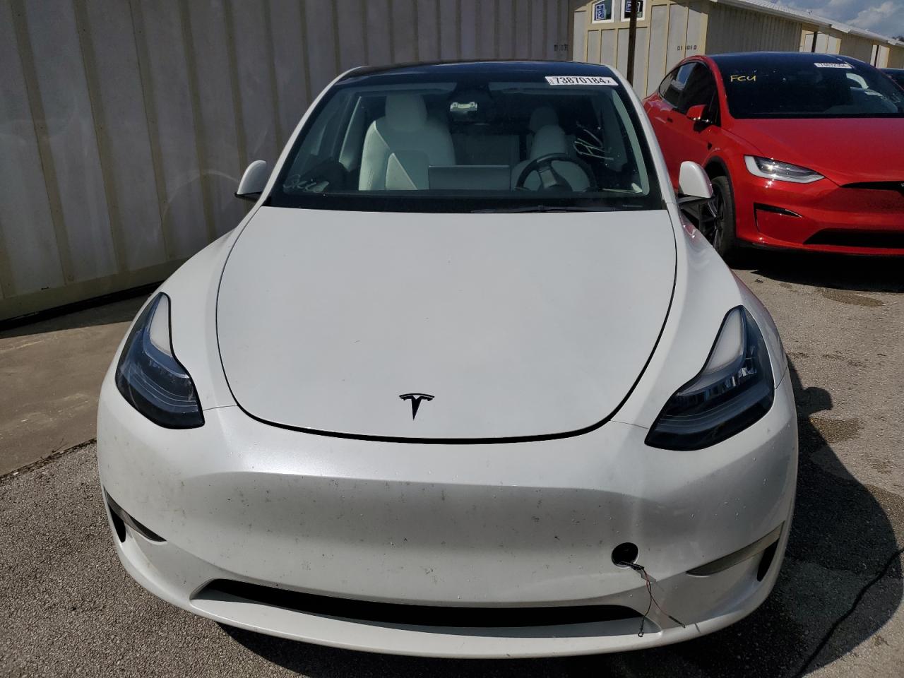 2023 Tesla Model Y VIN: 7SAYGDEE0PA099585 Lot: 73870184