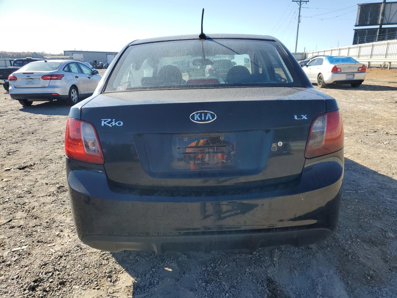 2011 Kia Rio Base VIN: KNADH4A39B6952874 Lot: 77768554