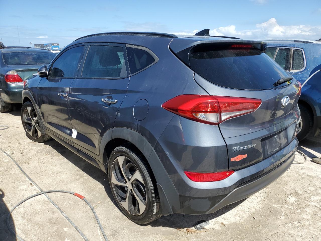 2016 Hyundai Tucson Limited VIN: KM8J33A21GU048974 Lot: 77244304