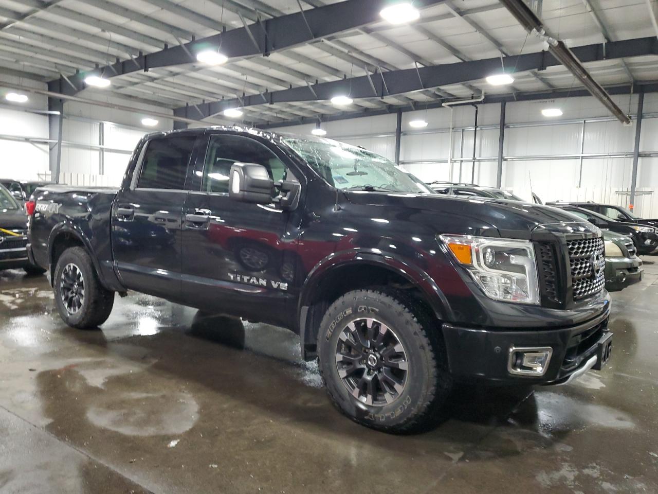 VIN 1N6AA1E51KN514194 2019 NISSAN TITAN no.4