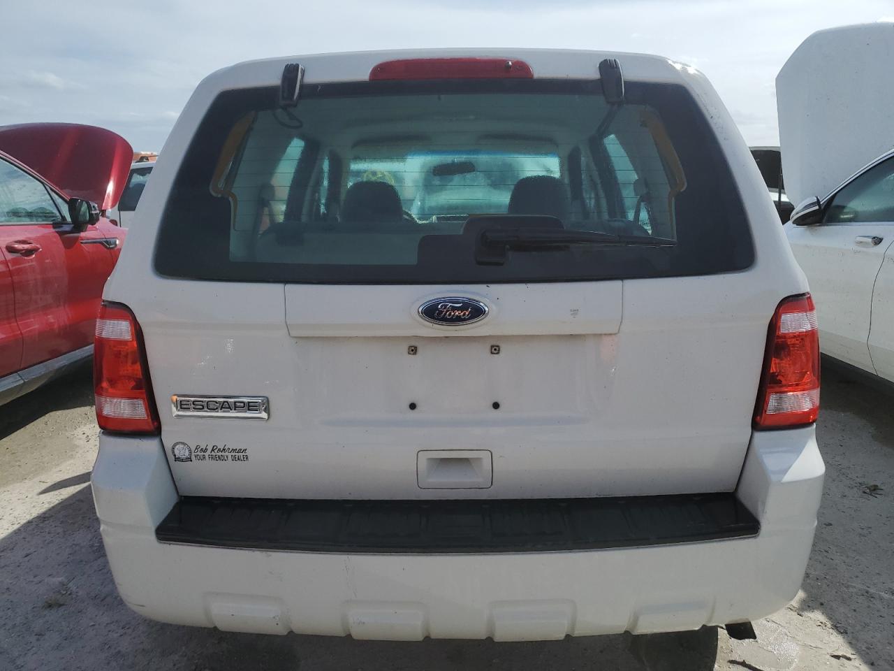 2010 Ford Escape Xls VIN: 1FMCU0C77AKC15077 Lot: 75435314