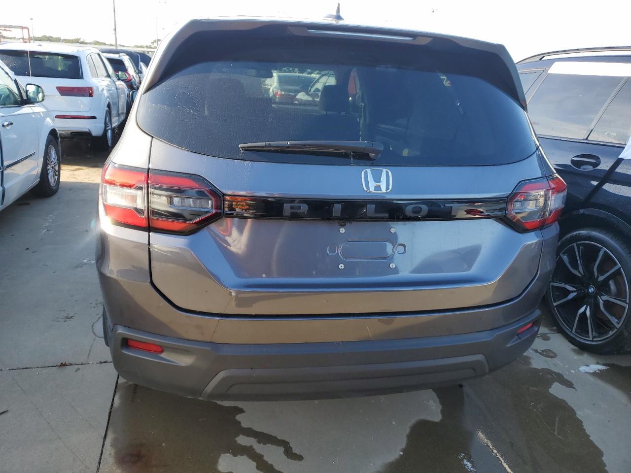 2023 Honda Pilot Lx VIN: 5FNYG2H21PB003100 Lot: 74374914