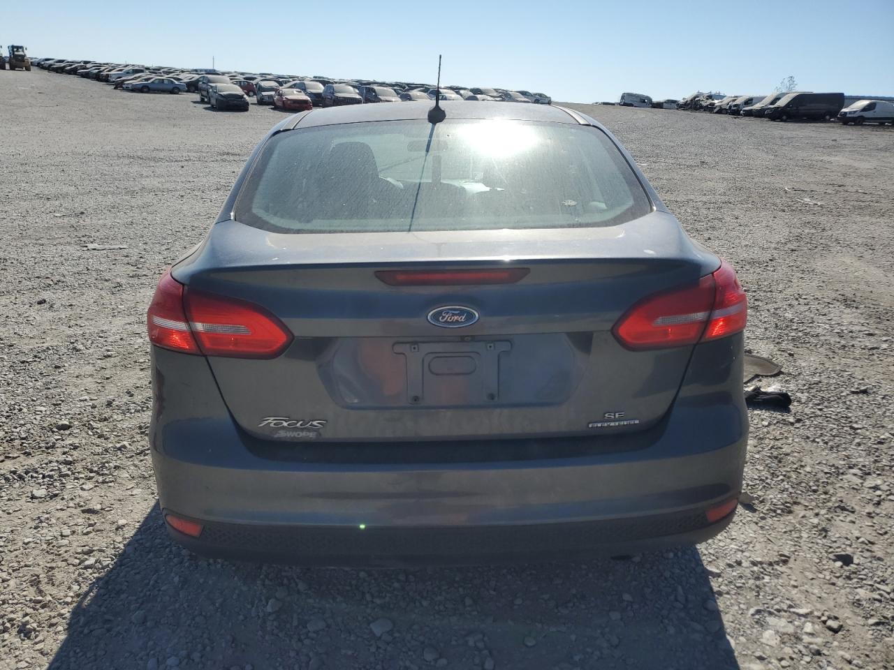 VIN 1FADP3F2XGL279737 2016 FORD FOCUS no.6