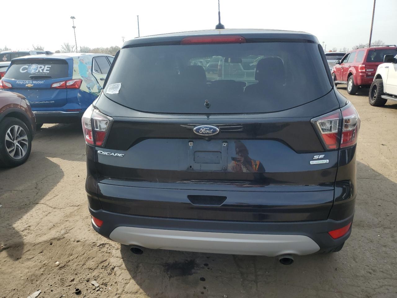 VIN 1FMCU0GDXHUA38328 2017 FORD ESCAPE no.6