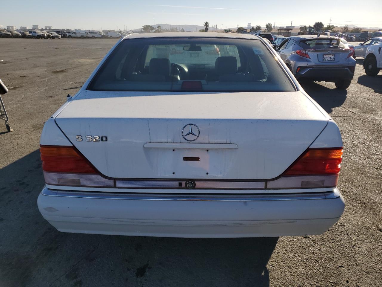 1995 Mercedes-Benz S 320W VIN: WDBGA32E8SA252144 Lot: 77053484