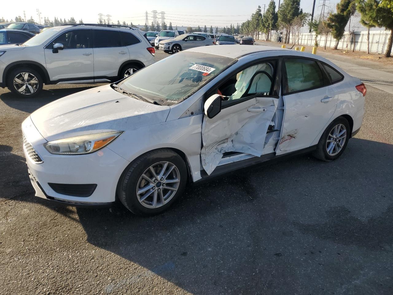 VIN 1FADP3F2XFL335335 2015 FORD FOCUS no.1