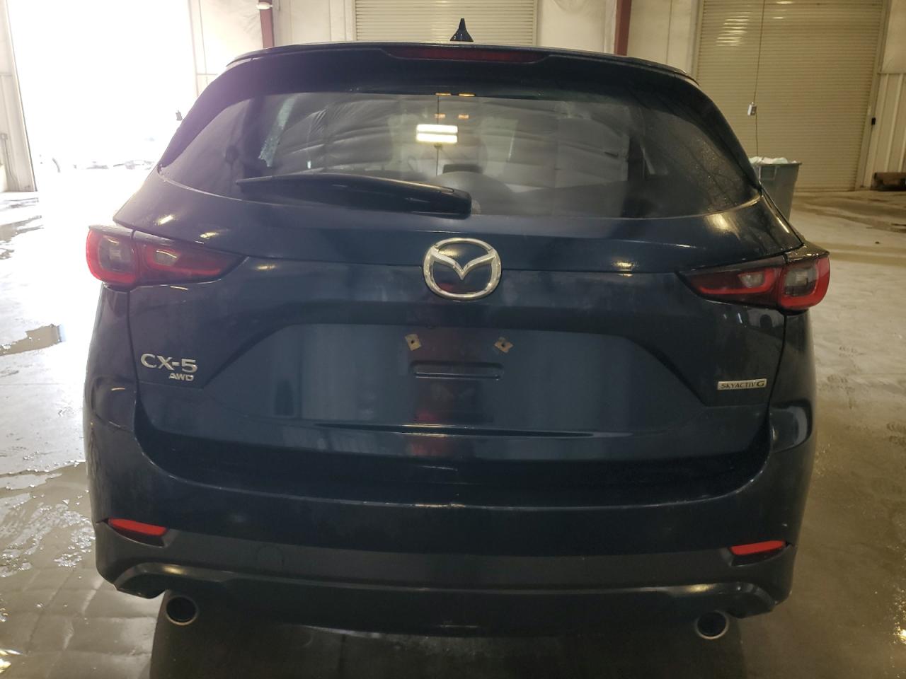 2022 Mazda Cx-5 Premium VIN: JM3KFBDMXN0636505 Lot: 77024134