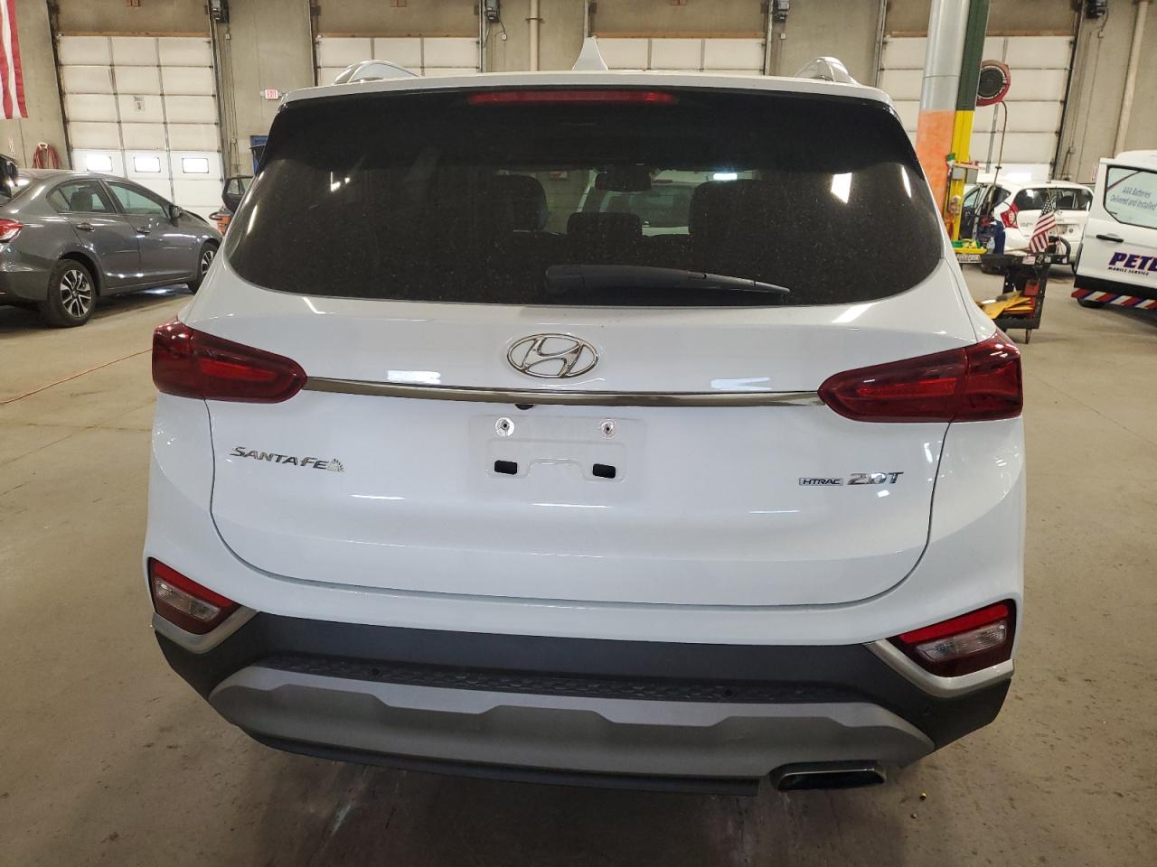 2019 Hyundai Santa Fe Limited VIN: 5NMS5CAA4KH010603 Lot: 76904804