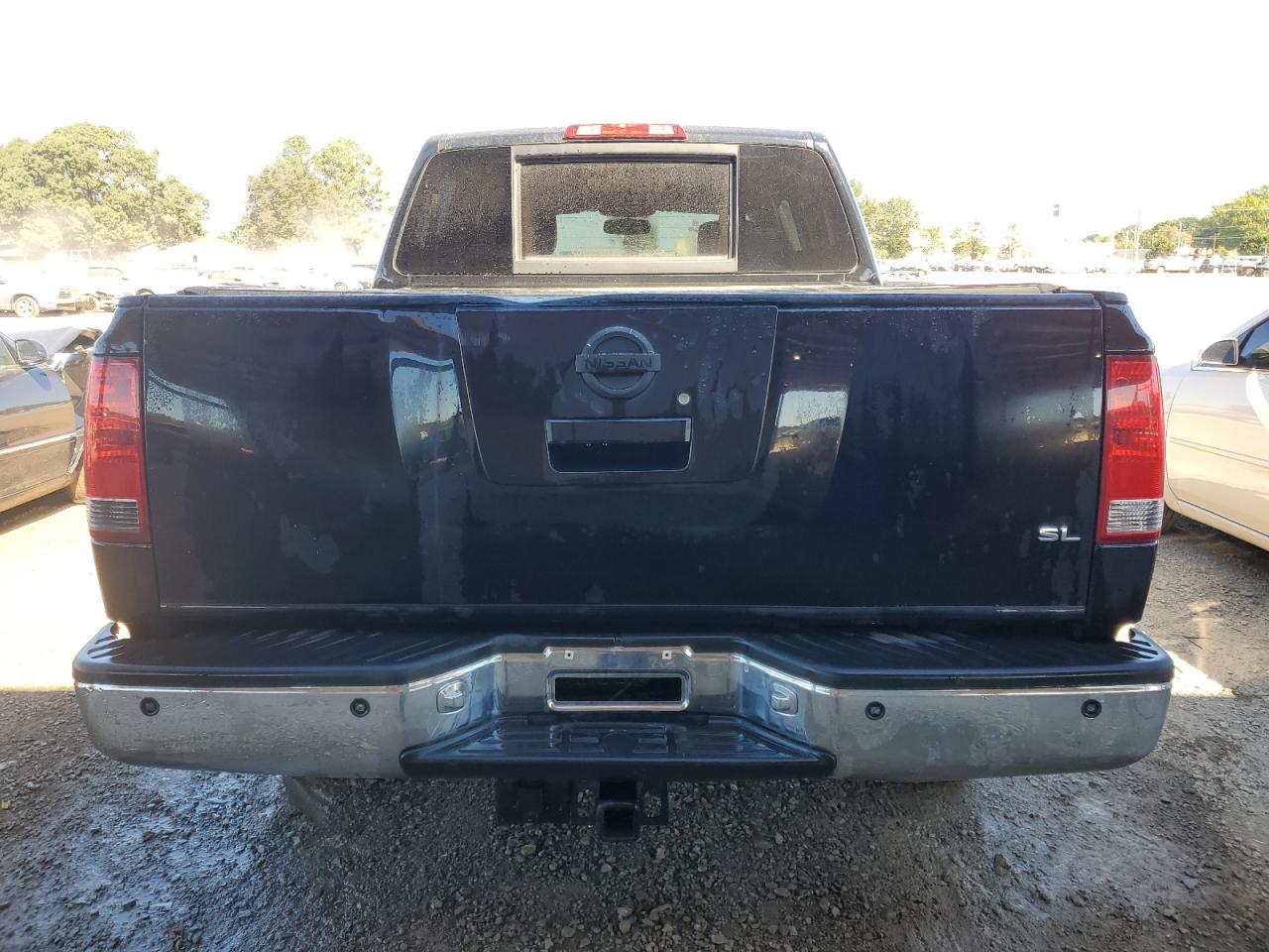 2011 Nissan Titan S VIN: 1N6AA0ECXBN310230 Lot: 76341564