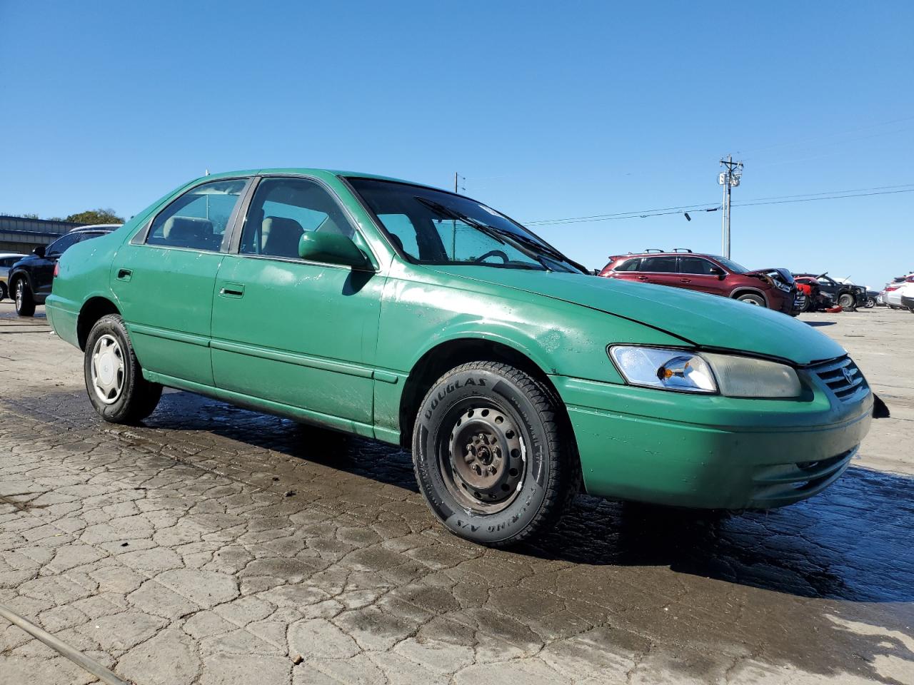 1999 Toyota Camry Ce VIN: 4T1BG22K9XU519500 Lot: 75266224