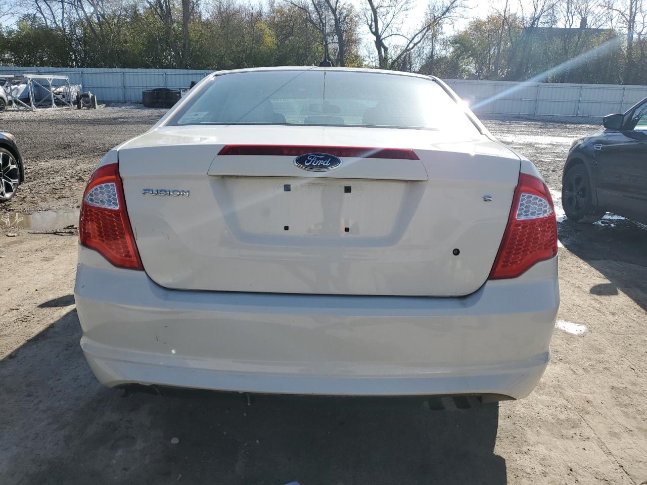 2011 Ford Fusion S VIN: 3FAHP0GA0BR243474 Lot: 77666014