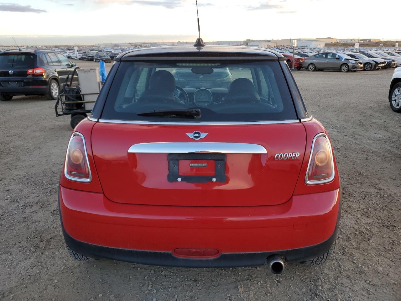 2010 Mini Cooper VIN: WMWMF3C54ATZ21563 Lot: 76508944