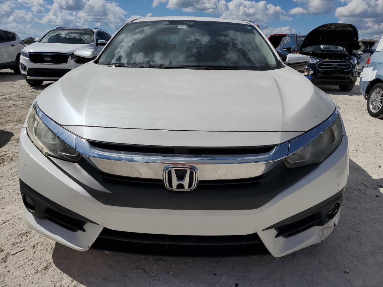 2018 Honda Civic Ex VIN: 19XFC1E31JE002813 Lot: 75404144