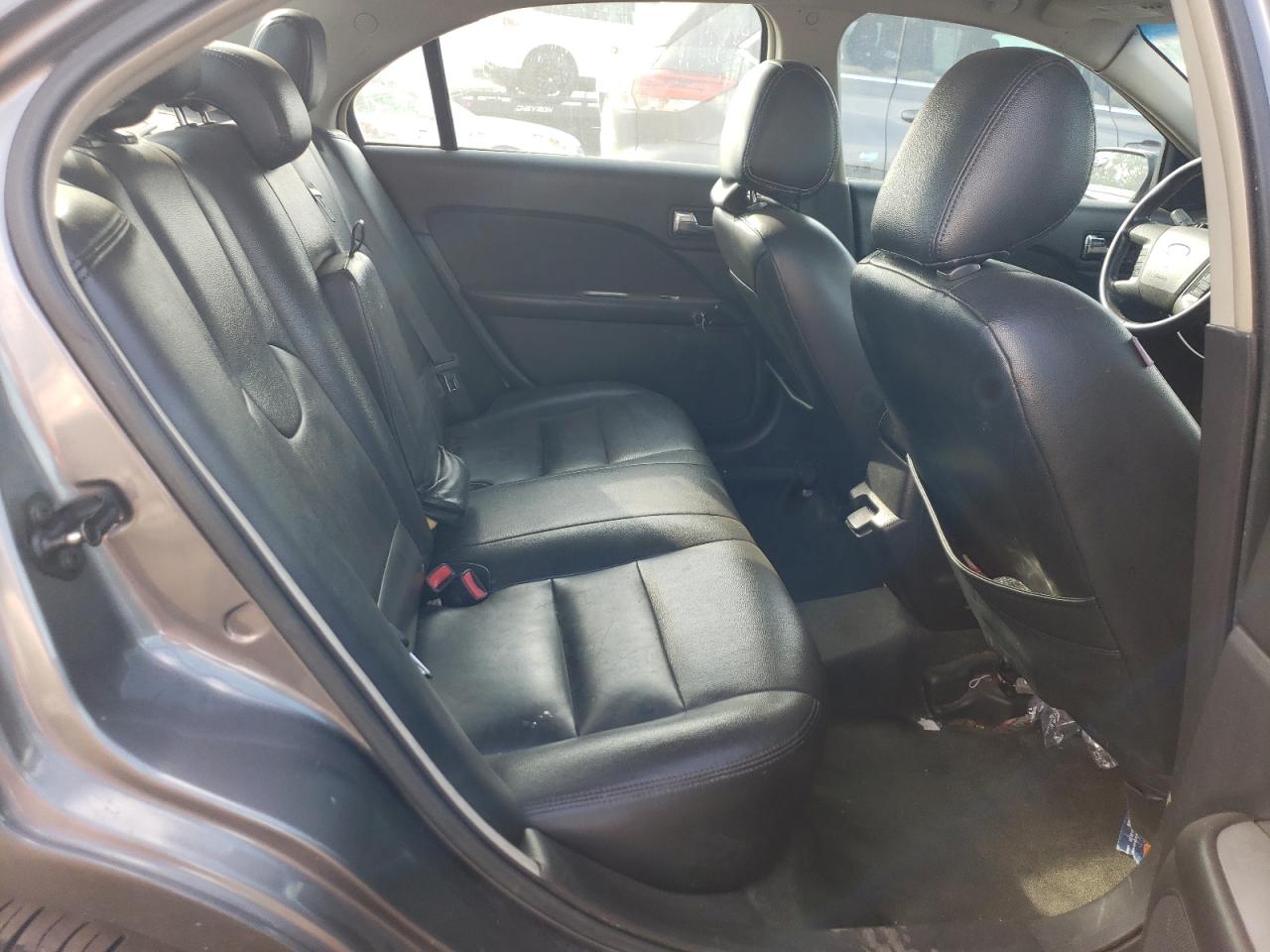 2012 Ford Fusion Hybrid VIN: 3FADP0L33CR399869 Lot: 75007624