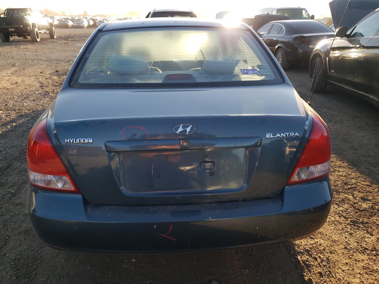 2003 Hyundai Elantra Gls VIN: KMHDN45D83U598594 Lot: 76713594