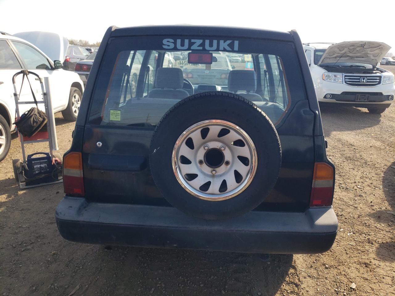 1998 Suzuki Sidekick Js VIN: 2S3TE02V1W6402490 Lot: 78316244