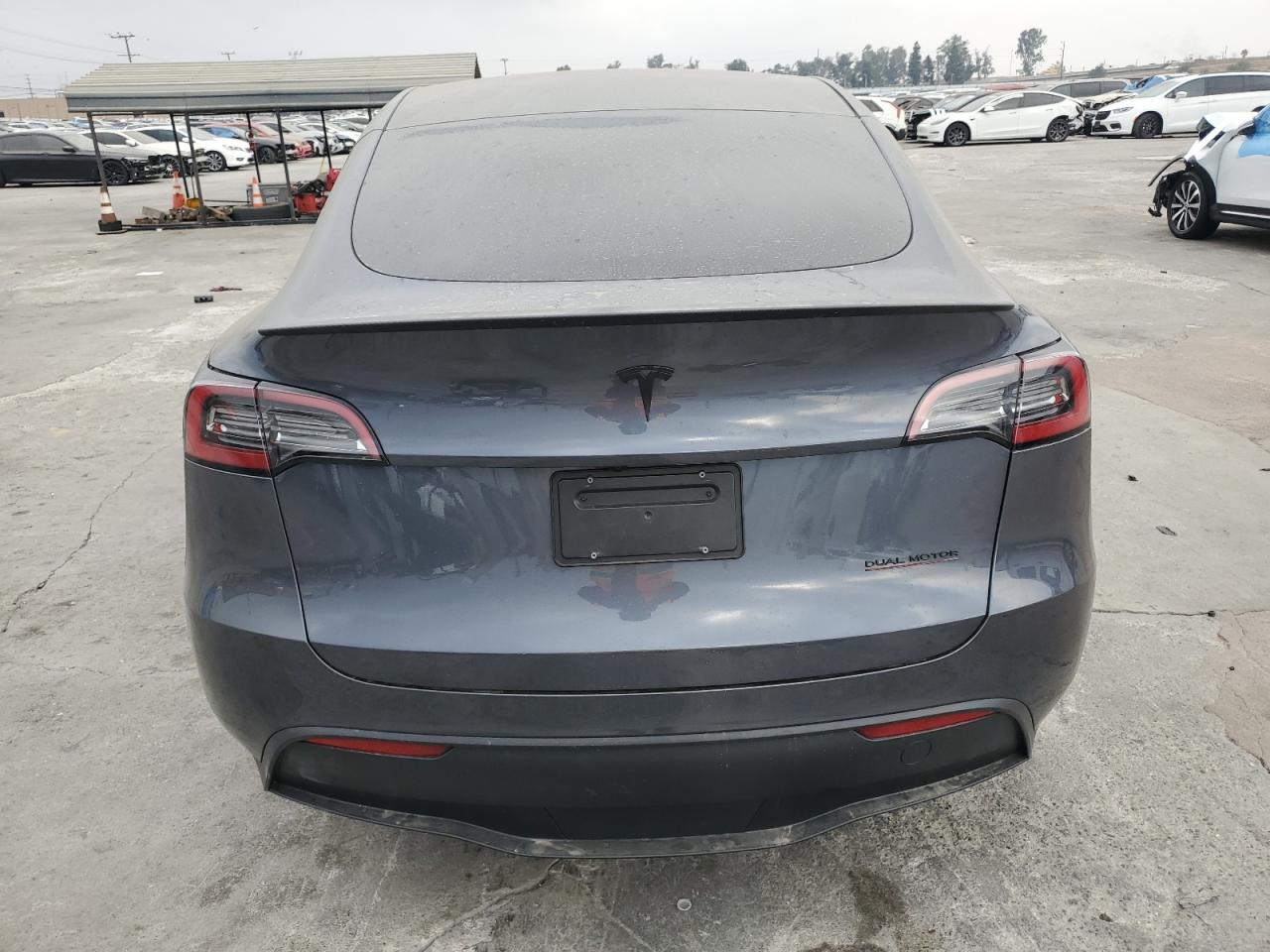 2023 Tesla Model Y VIN: 7SAYGDEF5PF957855 Lot: 77710014