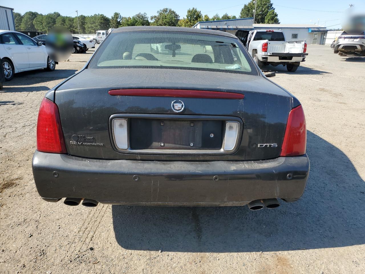 2002 Cadillac Deville Dts VIN: 1G6KF57912U148682 Lot: 73563664