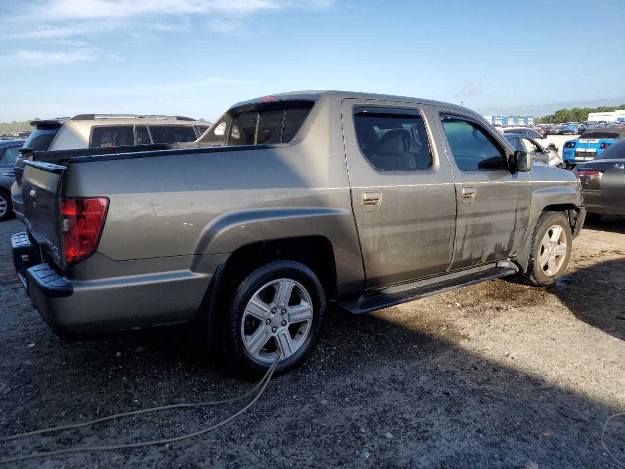 2011 Honda Ridgeline Rtl VIN: 5FPYK1F57BB003947 Lot: 73955584